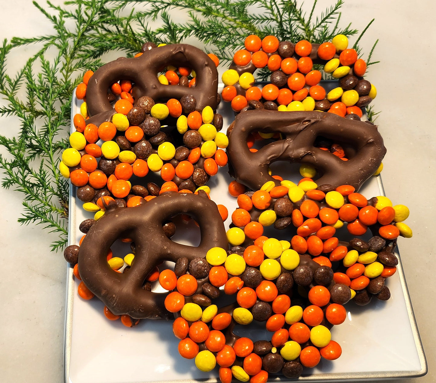 Milk Chocolate Dipped Pretzel Twists with Reese's Pieces - 12